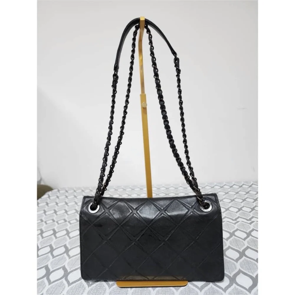 Authentic CHANEL Quilted Lambskin Leather Orient Express Flap Bag Black